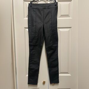 Chocolate faux leather fitted pants. Snug but stretchy. Slimming.